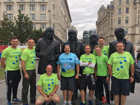 John Collett (second from left) with his team at the Liverpool Nightrider event
