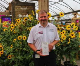 Paul Mason (Café Bar Manager at Squire’s Badshot Lea) with his “Outstanding Achievement” award from Surrey Choices