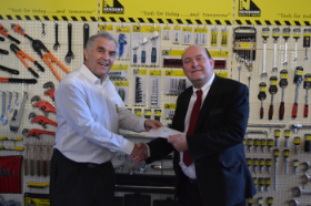 Martin Tonkin was awarded a special gift to commemorate his years of service with Newsome Tools