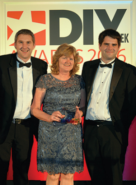 L-R: Chris, Vivienne and Jeff Abbott pick up their award for Hardware Retailer of the Year