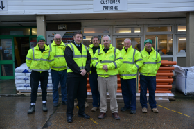 Covers Director Sean Clarke (front left) and Mike O’Kane (front right) and the OTBS team