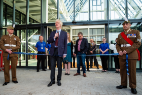 Trago Mills chairman Bruce Robertson opening the store