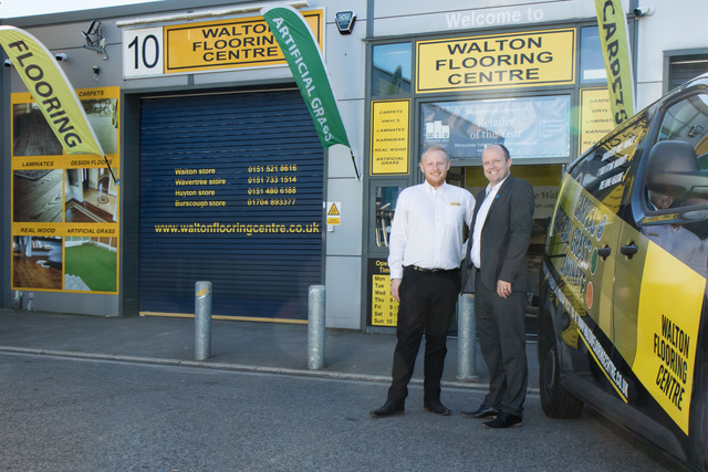 (L-R)Walton Flooring Centre managing director James Harper with Paul Trickett of Bathgate Business Finance outside Walton Flooring Centre headquarters in Huyton. 