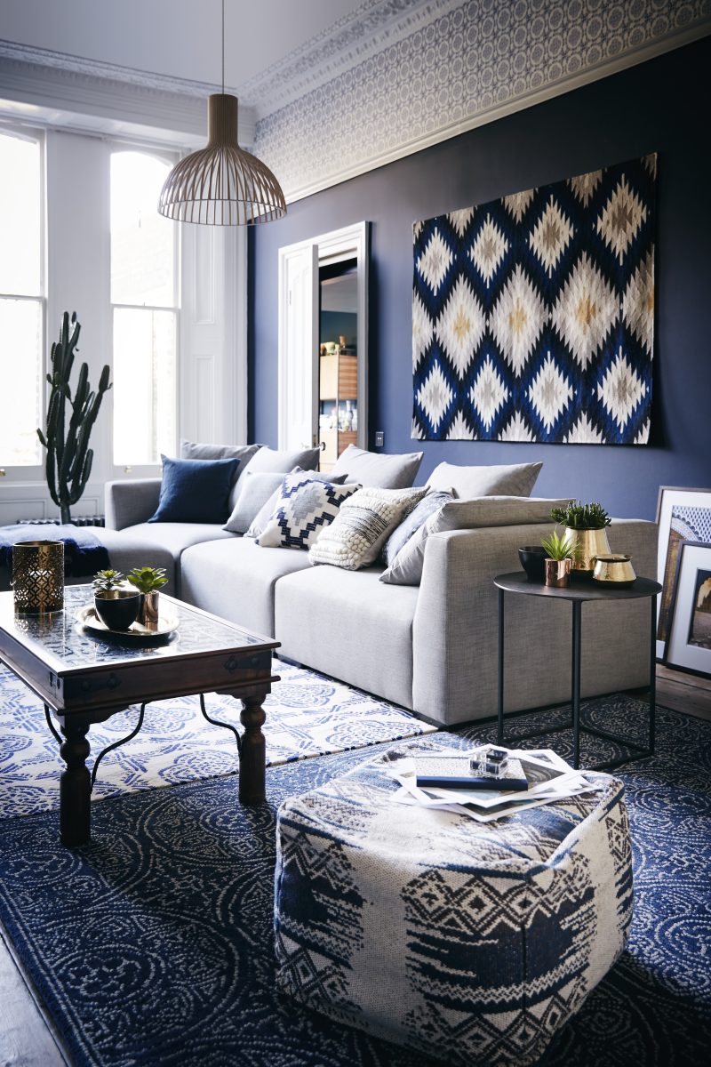 Despite a dip in home sales this week, John Lewis says consumers are still buying decorative accessories, such as rugs, art and mirrors to spruce up their homes