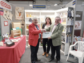 Pictured (L-R): Nick Pedlar (Home Hardware Director), Masha Vezouisek (Apollo Shipping Manager) and John Goodger (Apollo Marketing Director) on the winning stand.