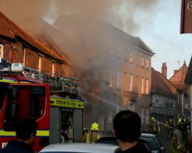 More than 50 firefighters tackled the blaze at DG Homecare, Watlington. Image by Tom Dixon.