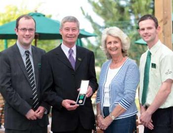 Employee clocks up 40 years of service at garden centre