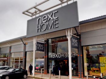 Next predicts consumer environment will 'remain sluggish'