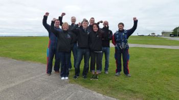 Rainy Day Trust volunteers parachute to victory